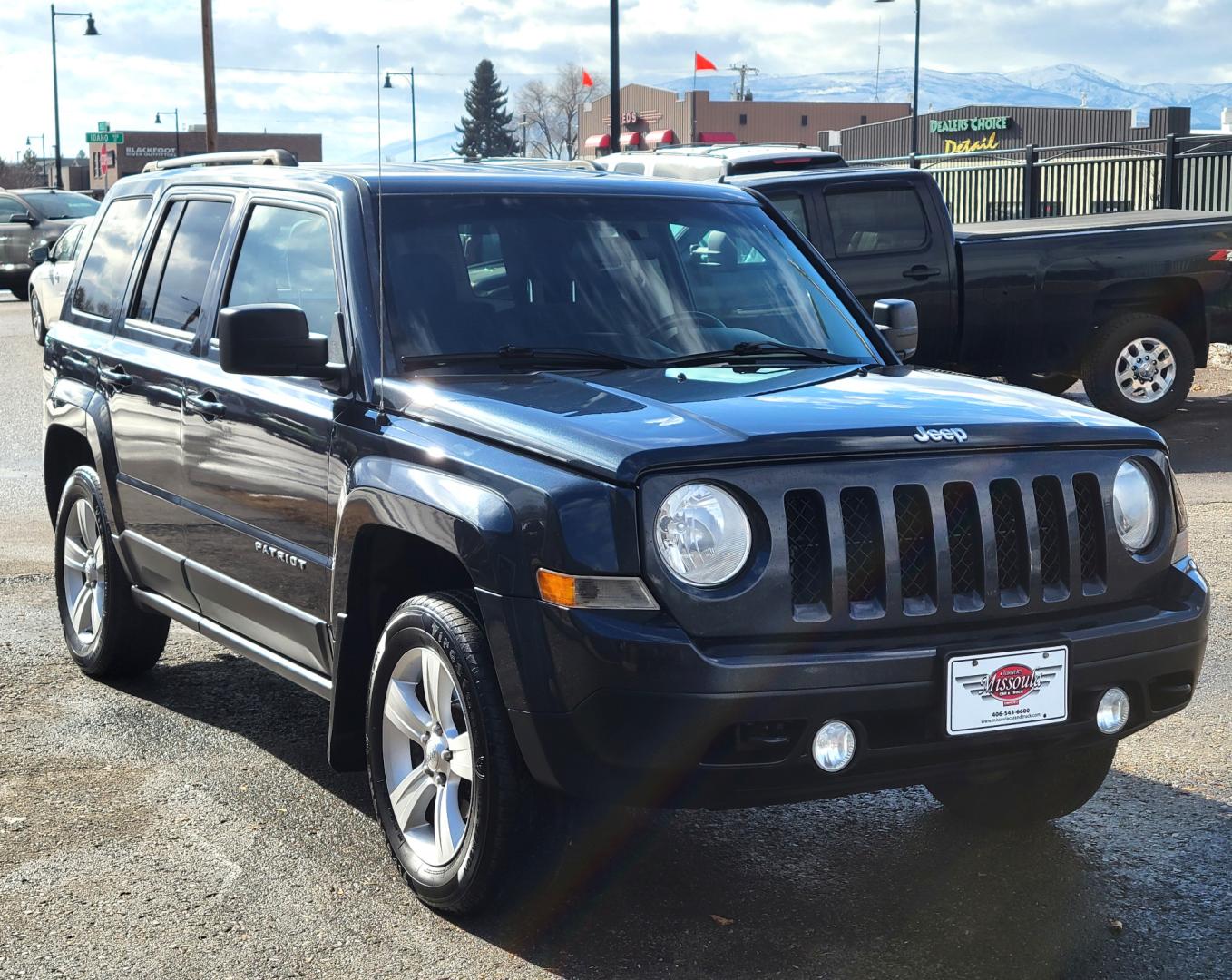 2014 Blue /Black Jeep Patriot Latittude (1C4NJRFB7ED) with an 2.4L I4 engine, 6 Speed Automatic transmission, located at 450 N Russell, Missoula, MT, 59801, (406) 543-6600, 46.874496, -114.017433 - Nice 4WD SUV. Heated Seats.6 Speed Automatic Transmission. 2.4L I4 Engine. Air. Cruise. Tilt. AM FM CD Satellite Radio. Firestone All-Season Tires. Power Windows and Locks. - Photo#2